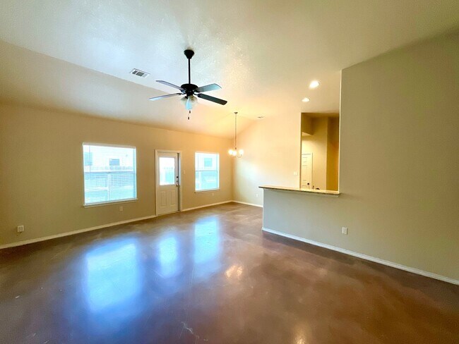 Building Photo - High Ceilings, Fenced Yard & 2-Car Garage – New Braunfels Living!