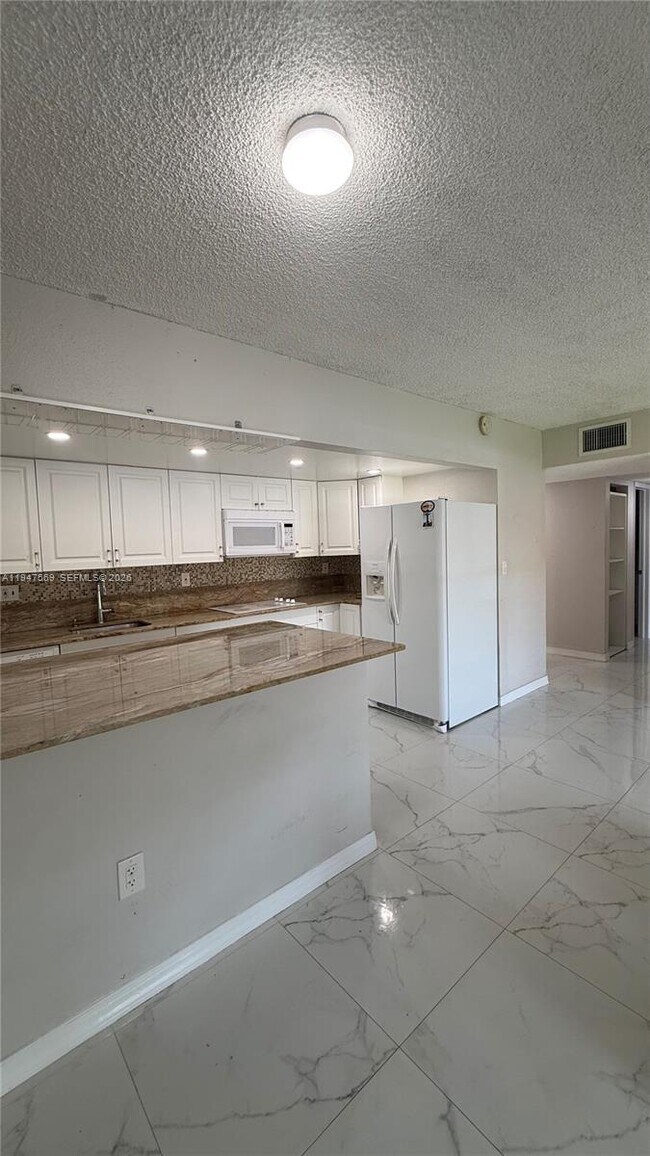 Building Photo - 17600 NW 68th Ave