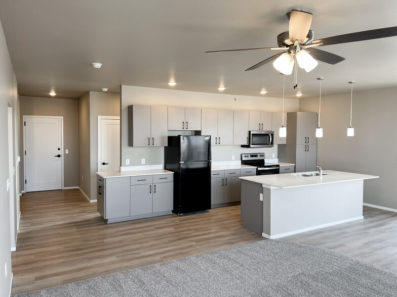 Brand New Building - Now Leasing! Visit UHVSF.COM - University Hills Village