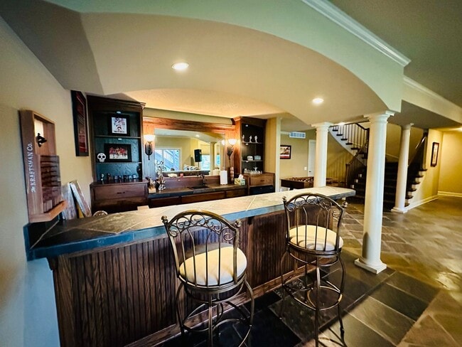 Building Photo - {9003} Wilshire Farms Reverse 1.5 Story Ho...