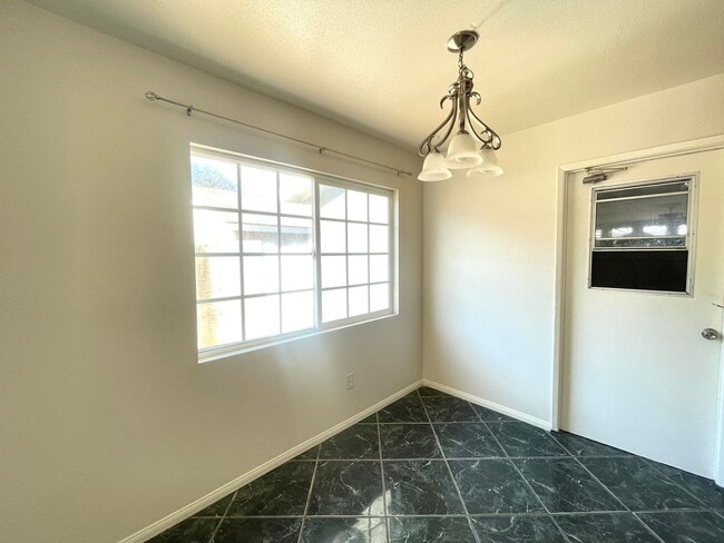 Building Photo - Newly painted Four Bedroom Two Bathroom Ho...