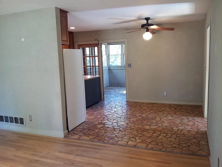 View of Kitchen and Sunroom from Living Area - 2725 Carolyn Dr SE