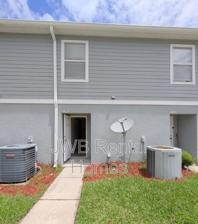 Building Photo - 8475 McGirts Village Ln