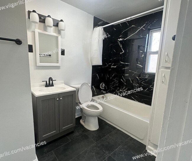 Building Photo - Newly Renovated 4 Bedroom • 2- Bathroom 3 story Home