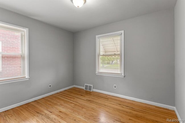 Building Photo - Cozy & Modern: 2-Bed Brick Home with Garage & Finished Basement