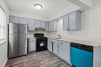 Building Photo - Summer Special! Updated 3BR Townhome with Basement + $250 Off First Month’s Rent