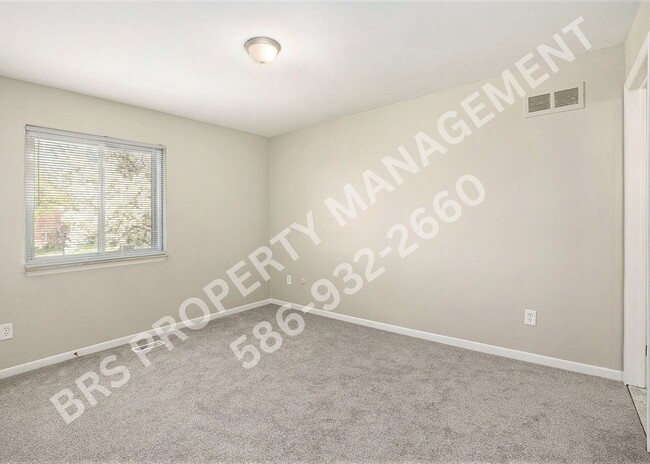 Building Photo - Charming 2-Bedroom Condo in Clinton Twp. –...