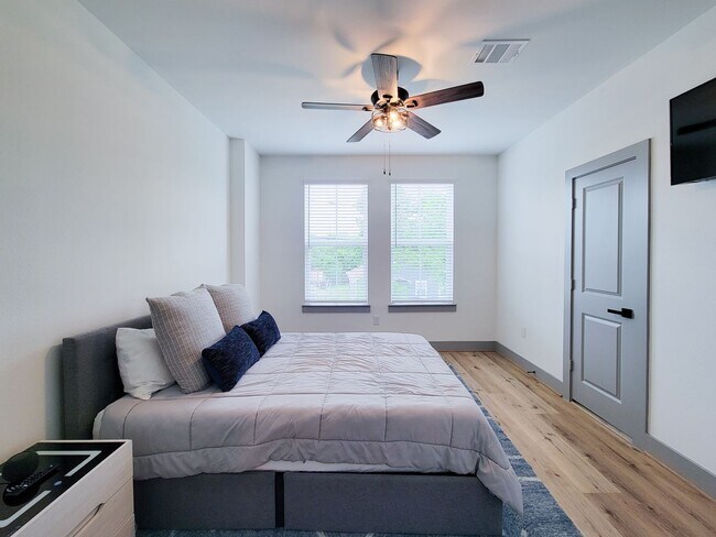 Building Photo - This 4-bedroom, 3-bathroom, two-story residence comes with a generous two-car attached garage. Re...