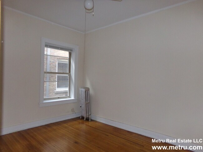 Building Photo - 1328 W Estes Ave