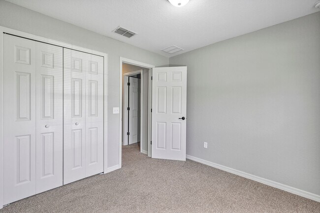 Building Photo - Freshly Painted 3BR Home with Spacious Yard, Modern Baths & No Deposit Option!