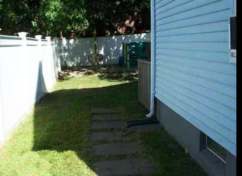 side yard - 23 Monroe St