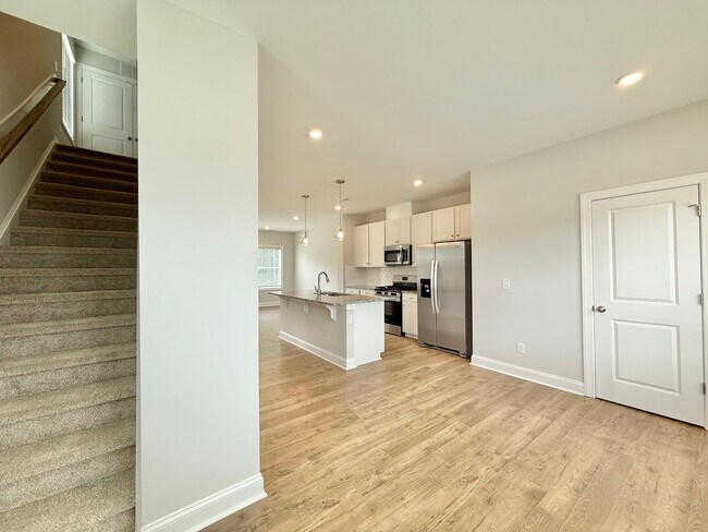 Building Photo - Stunning End Unit New Construction 3BD, 3....