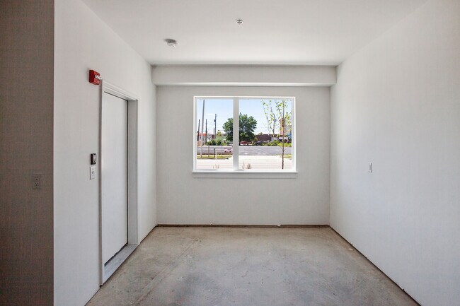 First floor entry from Garage - 727 N Illinois St