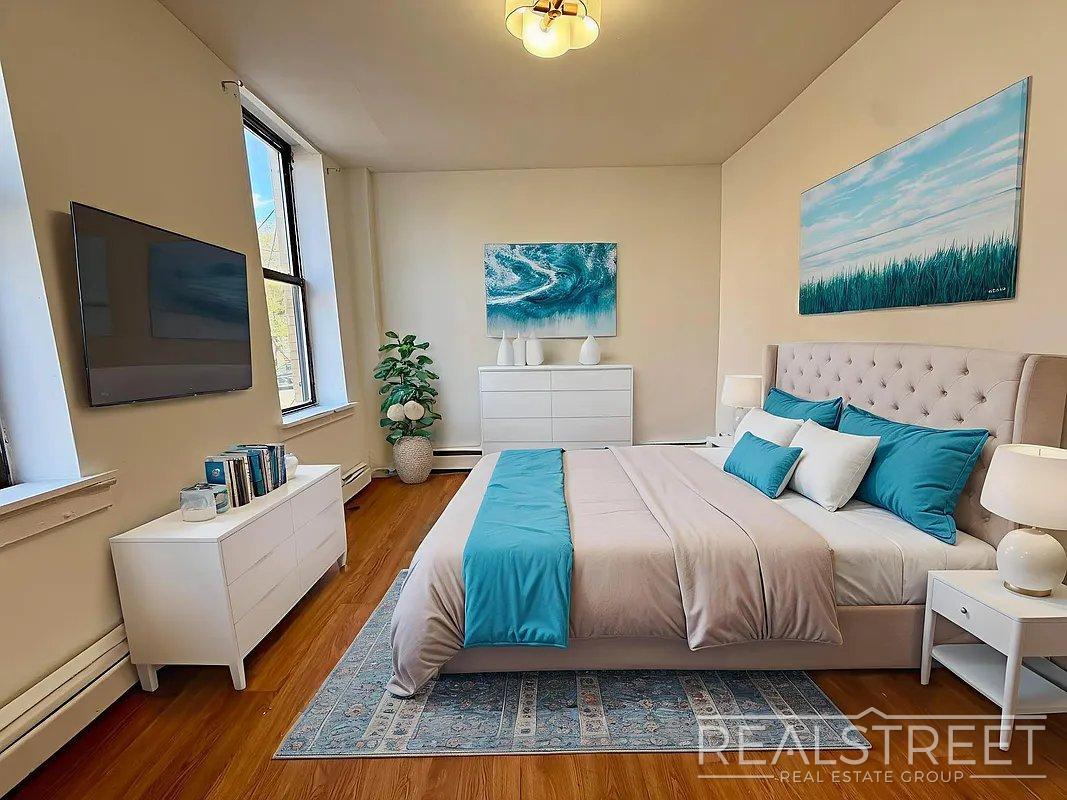Building Photo - Bright & Renovated 2-Bedroom Apartment with Modern Amenities and Roof Access