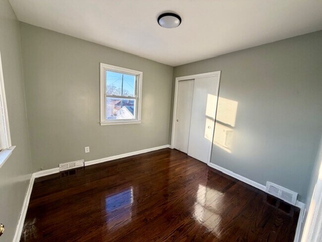 Building Photo - Three bedroom One and a half bath Brick Colonial home for lease