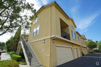 Building Photo - COMING SOON! Bordeaux 1 + 1 Condo in Santa...