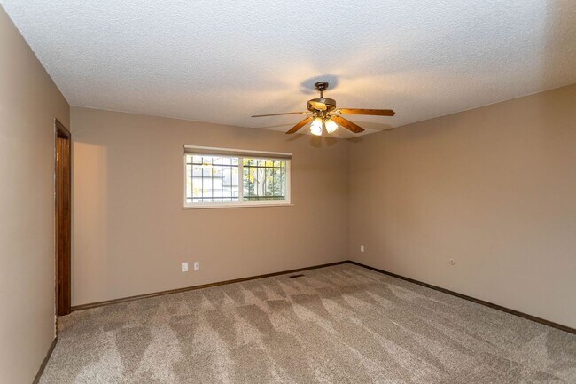Building Photo - Comfortable Ranch-Style Living with Large Fenced Backyard!