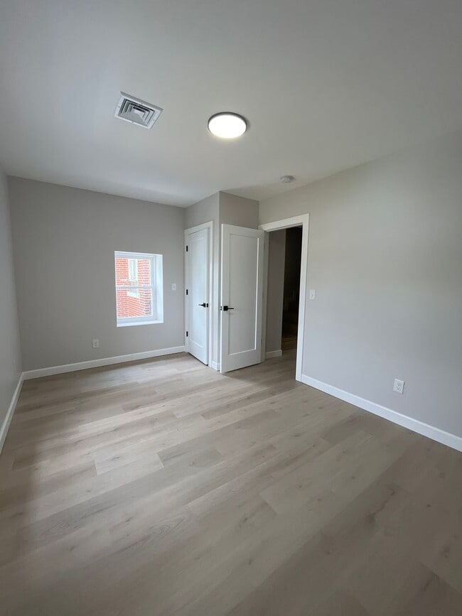 Building Photo - A real stunner! The full renovation is the first thing you'll notice..