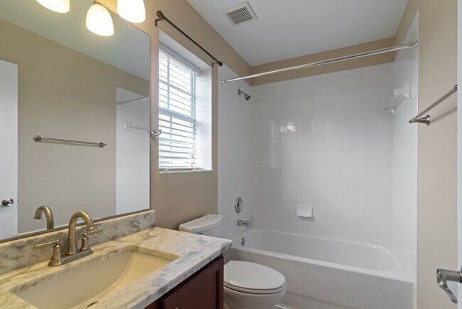 Building Photo - Executive Living Waits!