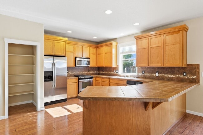 Building Photo - NEW Price - Delightful 4-Bedroom, 2.5-Bath...