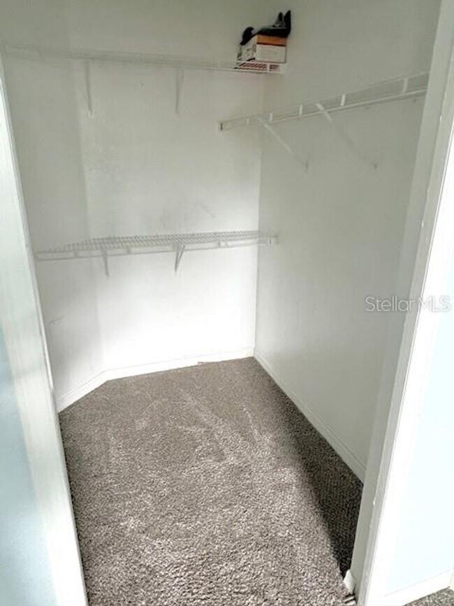 Building Photo - AVAILABLE NOW: First-floor 2-bedroom, 1-bath condo in Gated Community