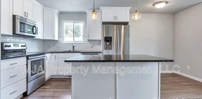 Building Photo - 5674 Magic Isle Ln