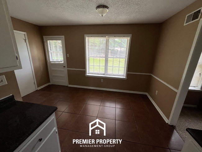 Building Photo - Spacious 4BR/2BA Whitehaven Home | 1,701 Sq Ft, Brick Fireplace & Quiet Cove