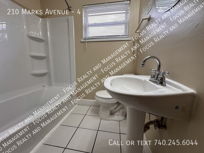 Building Photo - 210 Marks Ave