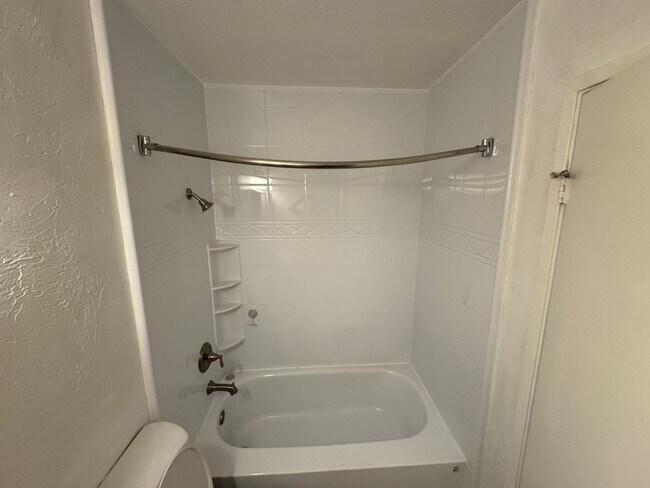 Building Photo - Two-Story 2 Bedroom, 1 Bath Lakeside Condo with Solar!