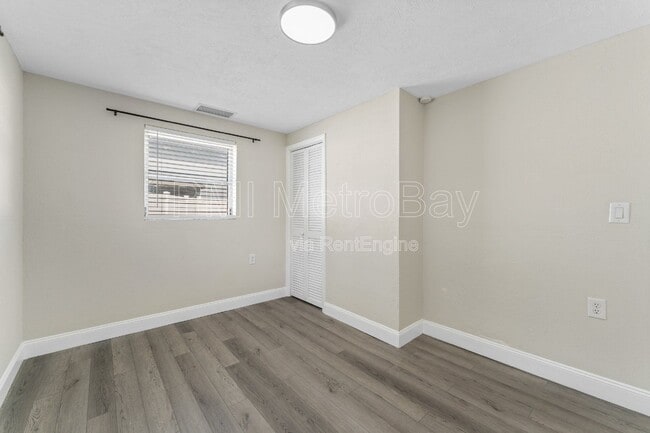 Building Photo - 6121 N Falkenburg Rd