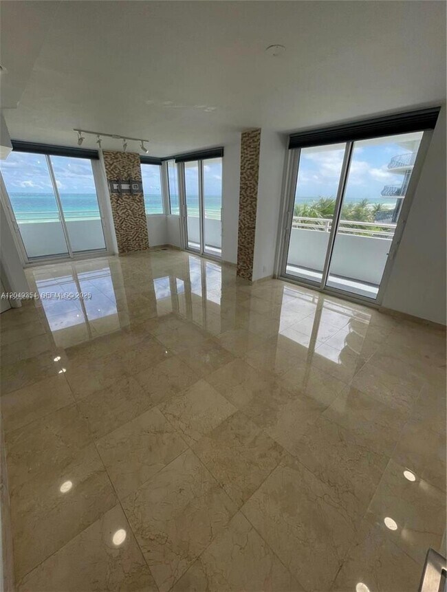 Building Photo - 8911 Collins Ave