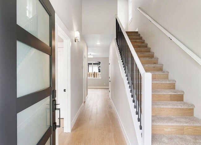 Building Photo - Brand-New 4-Bedroom Home Offering Modern Design, High-End Finishes, Attached Garage & Private Bac...