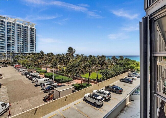 Building Photo - 6423 Collins Ave
