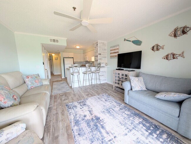 Building Photo - Dreamy Little River Condo — Furnished, Elevator Access, Pool & Marina Nearby!