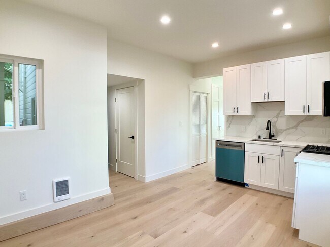 Building Photo - Lowered Price! FULLY Remodeled. BRIGHT! In-Unit W/D, Stainless Appliance Package, MODERN!