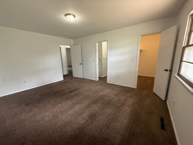 Building Photo - LOCATION! Check out this spacious 3 bedroom with 2.5 baths!