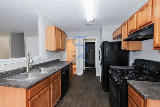 Building Photo - Move in before January 15th and choose your reward: a $250 Amazon Gift Card or a 55 Smart TV!