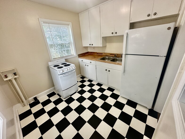 Butcher block counter top with washer/dryer connection - 111 South St