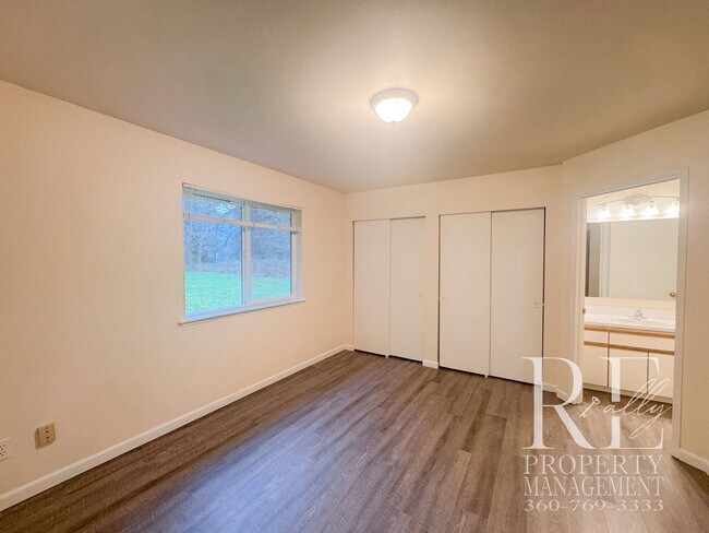 Building Photo - Duplex Living with Expansive Yard, LVP Flooring & Spacious Layout