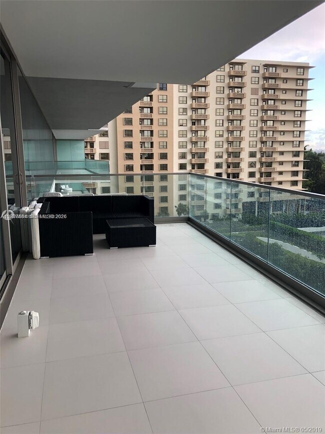 Building Photo - 10203 Collins Ave