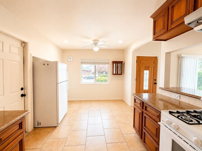 Building Photo - Bright, Updated Bungalow with 250 SF Bonus Sunroom