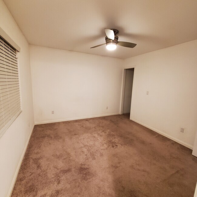 Master bedroom with walk in closet - 5731 Fulton Ave