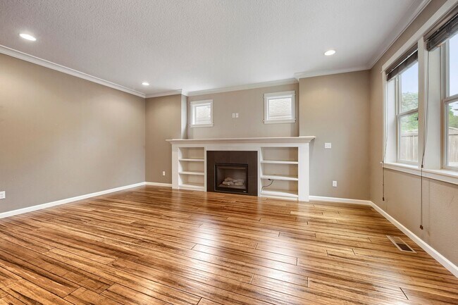 Building Photo - Custom-Built 4BR/2.5BA Two-Story Near Woodstock — Quartz Island Kitchen, Gas Fireplace & Fenced Y...