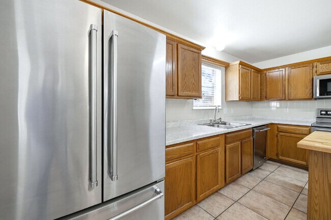 Building Photo - 4 Bedroom home with ZERO carpet close to RAFB