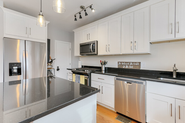 Kitchen with door leading to basement - 123 36th St NE