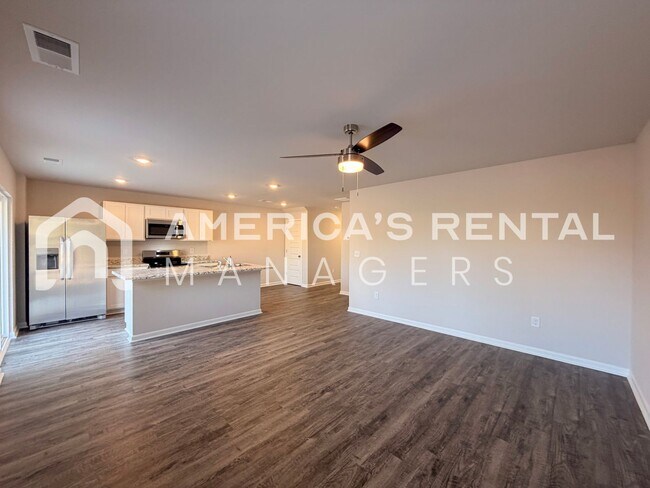 Building Photo - Spacious Two-Story Townhome with Open Layout!