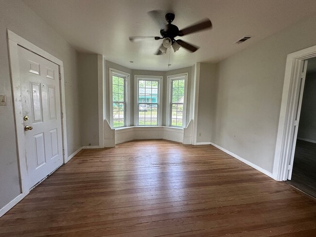 Building Photo - Welcome to this charming 3-bedroom, 2-bathroom home located in Atkins, AR