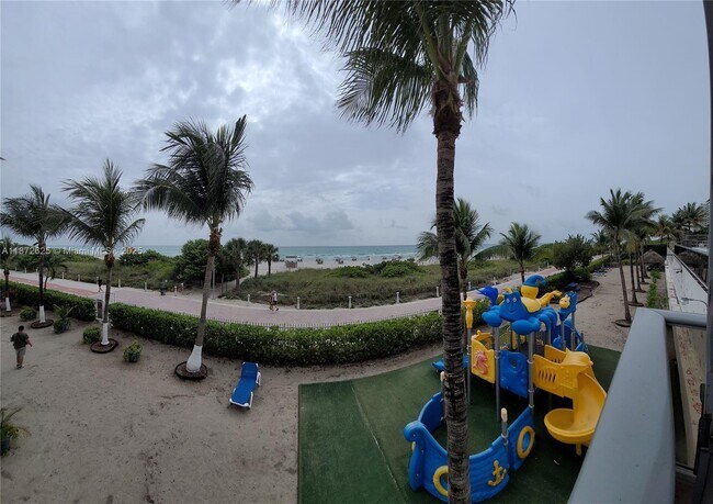 Building Photo - 6039 Collins Ave