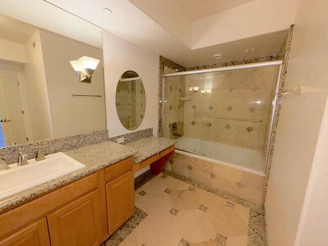 Building Photo - Riverwalk Tower 2 Bedroom Condo - 2 Parking Spaces/Private Laundry