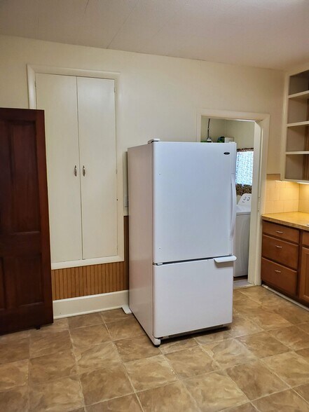 Large built in pantry to left of refrigerator - 607 Harrison Ave